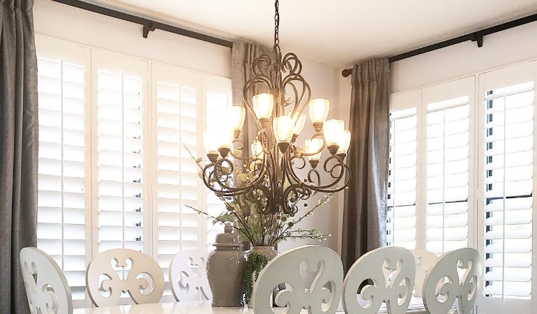 Plantation shades in a dining room.